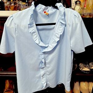 Beautiful light blue ruffled blouse